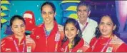  ?? PTI PHOTO ?? Saina Nehwal (left) with her father and shooters Apoorvi Chandela, Mehuli Ghosh and Tejaswini Sawant at the Games Village.