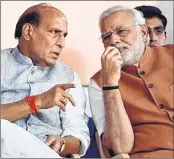  ?? PTI ?? Prime Minister Narendra Modi with home minister Rajnath Singh