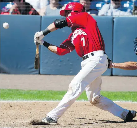  ?? GERRY KAHRMANN/PNG FILES ARLEN REDEKOP/PNG FILES ?? The Vancouver Canadians’ Josh Reavis had a rough start, going 0-15 at the plate, but the baseball gods finally smiled on the catcher when he hit a single in Boise one hot afternoon.