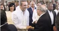  ?? FLORENTINO DURÁN/LISTÍN DIARIO ?? Luis Abinader y el presidente Danilo Medina se saludan en la Basílica de Higüey.