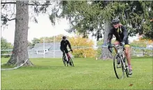  ?? KENNEDY GORDON/EXAMINER ?? Racers take part in the launch of the 2018 Shimano Canadian Cyclocross Championsh­ips at Nicholls Oval on Sunday.