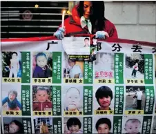 ?? — THE ASSOCIATED PRESS FILES ?? Chinese police have rescued 382 abducted babies and arrested 1,094 suspects.