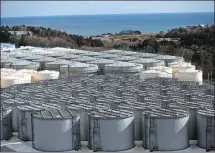  ?? ISSEI KATO / REUTERS ?? Storage tanks for radioactiv­e water are seen at Tokyo Electric Power’s tsunami- crippled Fukushima Daiichi nuclear power plant on Feb 18 last year.