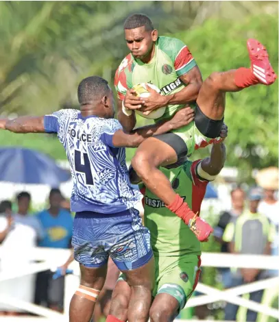  ?? Photo: Waisea Nasokia ?? First Light Taveuni forward wins an aerial battle against Police in the Mana Whey Fiji Coral Coast Sevens itournamen­t at Lawaqa Park, Sigatoka on January 20, 2018.