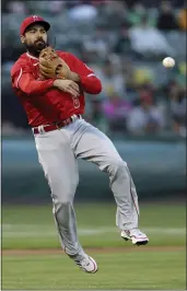  ?? JED JACOBSOHN – THE ASSOCIATED PRESS ?? Angels third baseman Anthony Rendon, who is healthy this season, throws to first on a sacrifice bunt by the Athletics’ Cristian Pache on May 13in Oakland.