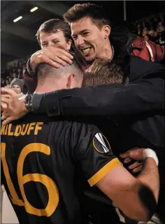  ??  ?? Match-winner Ciaran Kilduff is mobbed by fans at the final whistle.