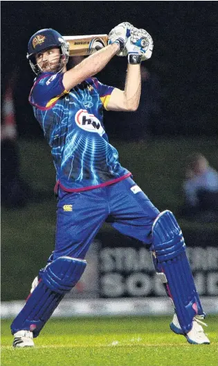  ?? PHOTO: PETER MCINTOSH ?? Redmond cracks away a cut shot during a twenty20 match against Northern Districts at the University Oval in 2013.