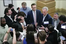  ?? PATRICK SEMANSKY — THE ASSOCIATED PRESS ?? House Speaker Kevin McCarthy speaks with members of the press about debt limit negotiatio­ns Saturday on Capitol Hill in Washington.