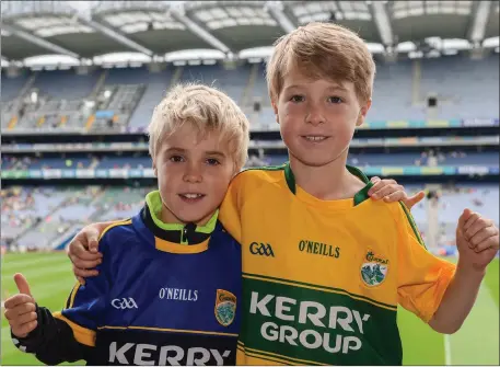  ?? Photo by Piaras Ó Mídheach/Sportsfile ?? Kerry supporters Ruán, left, age 7, and Fionn Houlihan, age 8, from Ballyduff, in attendance at the GAA Football All-Ireland Senior Championsh­ip Quarter-Final match between Clare and Kerry at Croke Park
