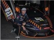  ?? TODD TELFORD PHOTO ?? Tiburon’s Memo Gidley kneels by the McLaren 570S GT4 that he’ll co-drive in the Pirelli GT America SprintX races this weekend at Sonoma Raceway.