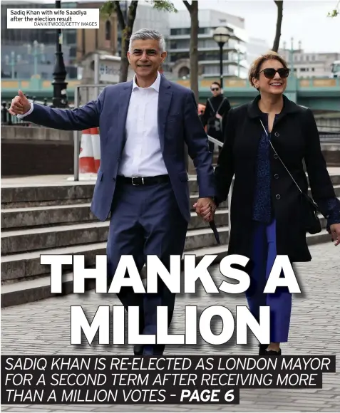  ?? DAN KITWOOD/GETTY IMAGES ?? Sadiq Khan with wife Saadiya after the election result