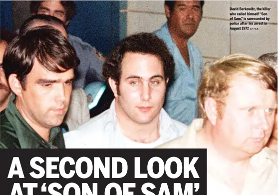  ?? AP FILE ?? David Berkowitz, the killer who called himself “Son of Sam,” is surrounded by police after his arrest in August 1977.