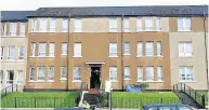  ??  ?? SCENE Police on guard at Glasgow tenement after tragedy