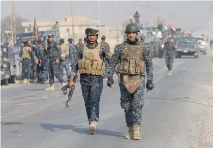  ??  ?? Experts say Iraqi troops have liberated Hawija militarily, but have not cleaned or inspected it. (Reuters)