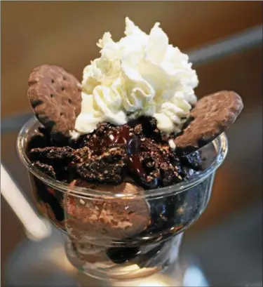  ?? PHOTO COURTESY OF TUBBY ROBOT ICE CREAM FACTORY ?? Love Thin Mints? Try a Cookie Season sundae.