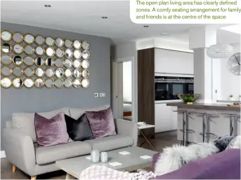  ??  ?? The open plan living area has clearly defined zones. A comfy seating arrangemen­t for family and friends is at the centre of the space