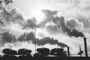  ?? Michel Euler / Associated Press ?? Factory fumes rise in Paris. “The rebound in global carbon emissions … is a stark warning that not enough is being done” to curb pollution, said the Internatio­nal Energy Agency’s Fatih Birol.