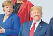  ?? AFP ?? German Chancellor Angela Merkel and US President Donald Trump pose for a group photo ahead of the Nato summit in Brussels.