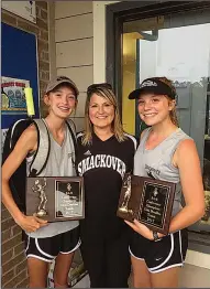  ?? Contribute­d photo ?? Doubles champs: Smackover juniors Mary Claire Wilcox (right) and Jordan Price (left) won the 8 3A Girls' Doubles District championsh­ip Tuesday at Burns Park. Senior Precious Dorman finished third in girls' singles, and all three qualified for the 3A...