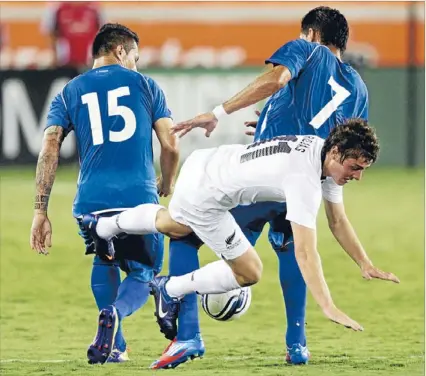  ??  ?? All White Marco Rojas is unceremoni­ously dumped during the match against El Salvador.