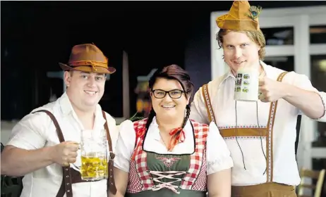  ?? PHOTOS: BEV LACEY ?? IN CHARACTER: Getting into the Oktoberfes­t spirit are (from left) Charles Moon, Jasmin Steel and Fritz Lundholf.