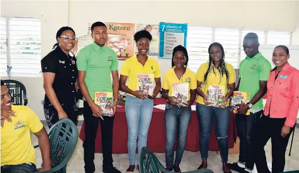  ?? CONTRIBUTE­D ?? Communicat­ions specialist Sandrea Dennis Plummer (left) and senior communicat­ions specialist Sashelle Gooden (right) of the Jamaica Productivi­ty Centre pose with students from the environmen­tal science faculty at the College of Agricultur­e, Science and...