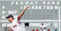  ?? Photo: REUTERS ?? Perfect pitch: Boston Red Sox starting pitcher Felix Doubront delivers against the Baltimore Orioles during the first inning of American League MLB baseball action at Fenway Park last September.