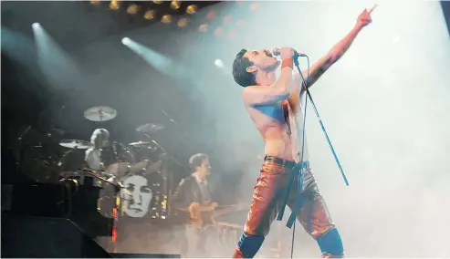  ?? — 20TH CENTURY FOX ?? Rami Malek is dynamic as charismati­c singer Freddie Mercury in a biopic that explores both the man and the performer who was the gyrating, fist-pumping centrepiec­e of ’70s rock band Queen.