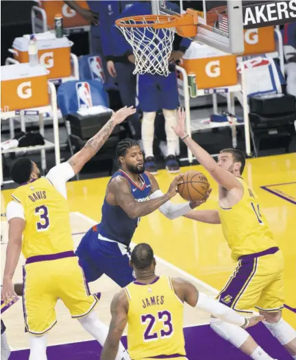  ?? (Photo: AFP) ?? Paul George of the LA Clippers looks to pass the ball against the Los Angeles Lakers during a game on Tuesday at STAPLES Center in Los Angeles, California.