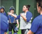  ?? PHOTO COURTESY MEMPHIS ATHLETICS ?? First-year Memphis softball coach Stephanie Vanbrakle Prothro addresses the team during a practice on Feb. 3.