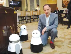  ??  ?? LAS VEGAS: Mayfield Robotics CEO Michael Beebe poses with his Kuri robot, launched at the 2017 Consumer Electronic­s Show in Las Vegas, Nevada on Friday. — AFP