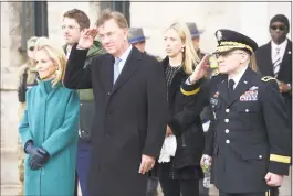  ?? Arnold Gold / Hearst Connecticu­t Media ?? Gov. Ned Lamont, center, salutes outside of the Governor William A. O’Neill Armory after being sworn into office in Hartford on Jan. 9.