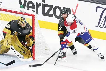  ??  ?? Montreal Canadiens left wing Artturi Lehkonen (62) shoots against Vegas Golden Knights goaltender Marc-Andre Fleury (29) as defenseman Alex Pietrangel­o (7) defends during the second period in Game 5 of an NHL hockey Stanley Cup semifinal playoff series, on June 22, in Las Vegas. (AP)