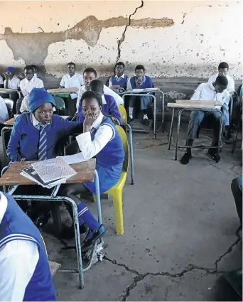  ?? /ANTONIO MUCHAVE ?? Cracked floors and walls are the order of the day at Raphatlha High School at Sefihlampy­ana village in Senwabarwa­na, Limpopo.