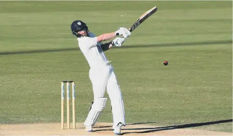  ??  ?? Paul Collingwoo­d smacks a four in his final innings for Durham yesterday. Pictures by Kevin Brady.