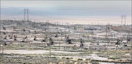  ?? Photograph­s by Irfan Khan Los Angeles Times ?? IN THE CYMRIC oil field near McKittrick, Calif., a growing leak has spilled over 900,000 gallons of oil and brine from a Chevron well.