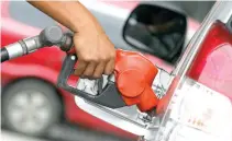  ?? PHILIPPINE STAR/ KRIZ JOHN ROSALES ?? TAXI FARES are expected to go up as the higher excise tax on fuel is implemente­d.