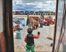  ?? ?? The cargo truck departing from Dodma township, Shuanghu county, Tibet.