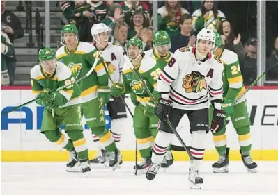  ?? ABBIE PARR/AP ?? Blackhawks right wing Patrick Kane reacts after the Wild’s second goal during the second period Friday in St. Paul, Minn.