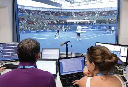  ??  ?? The view from the Hawk-eye control booth (left) during the 2014 Brisbane Internatio­nal Tournament. Around the globe, more than 80 tennis tournament­s now use the technology as an officiatin­g aid.