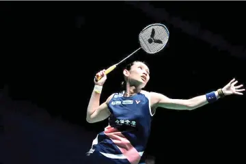  ?? — AFP photo ?? Taiwan's Tai Tzu Ying hits a return against Thailand's Ratchanok Intanon during their women's singles quarter-final match at the Malaysia Open in Kuala Lumpur.