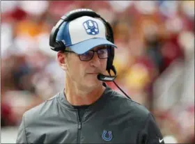  ?? ALEX BRANDON — THE ASSOCIATED PRESS ?? Indianapol­is Colts head coach Frank Reich walks on the sideline in the second half of an NFL football game against the Washington Redskins Sunday in Landover, Md.