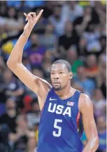  ?? MATT YORK/ASSOCIATED PRESS ?? Once Kevin Durant got hot, Serbia was finished during Sunday’s gold medal game. Durant had 30 points as the USA rolled 96-66.