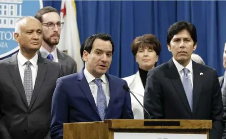  ?? RICH PEDRONCELL­I/THE ASSOCIATED PRESS ?? California Assembly Speaker Anthony Rendon, at the podium, has said that the state’s pro-immigrant stance will continue in spite of Donald Trump.