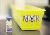  ?? ASSOCIATED PRESS FILES ?? A since-discredite­d study nearly a decade ago that linked the measles, mumps and rubella vaccine to autism led to panic over vaccinatio­n and a controvers­y that is still ongoing.