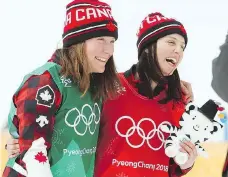  ?? JEAN LEVAC ?? Silver medallist Brittany Phelan of Mont-Tremblant, Que., left, and gold medallist Kelsey Serwa of Kelowna, B.C., celebrate their success following the women’s ski-cross final at Phoenix Snow Park.