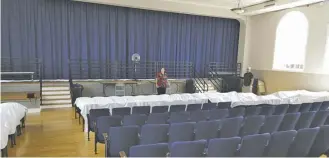  ?? COURTESY PHOTO ?? Rabbi Rose Jacob, center, in the renovated space at the Marshall Community Center that will host her High Holiday services.