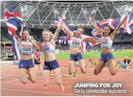  ??  ?? JUMPING FOR JOY Girls celebrate success