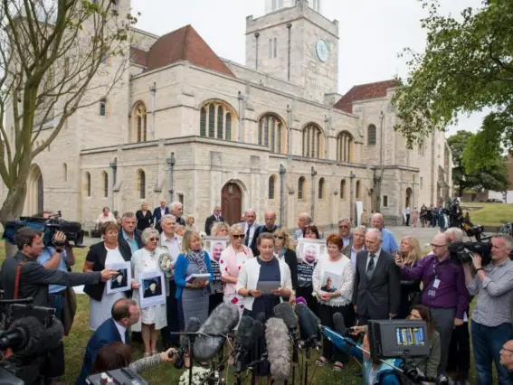  ??  ?? Victims’ families speak outside Southampto­n Cathedral after board revealed findings (PA)