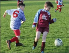  ??  ?? Seán Dwyer of Ferns United in action against Ryan Kavanagh (Bunclody) during last week’s clash.